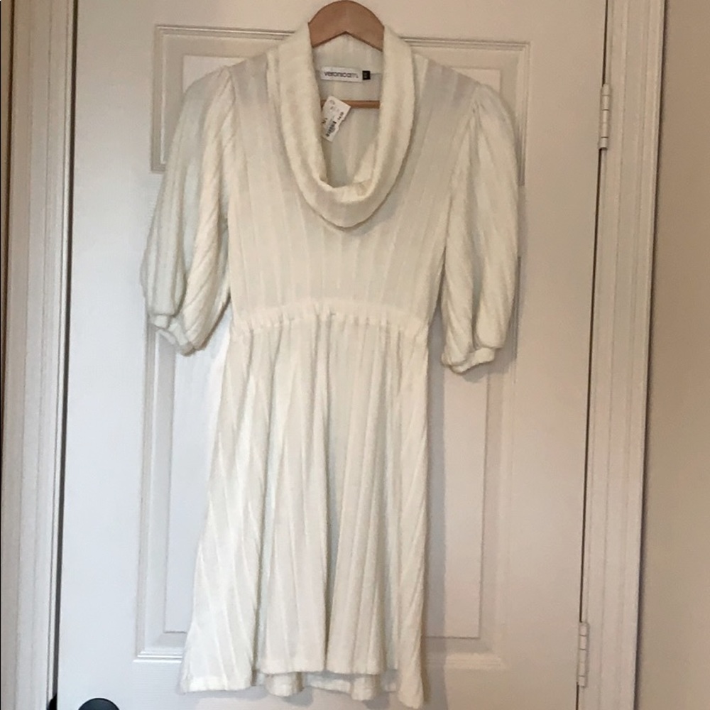 Mid sleeve sweater dress. NWT. Cream colored.